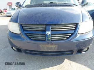 2005 Dodge Caravan SXT with VIN 2D4GP44L65R565519, listed as a IAAI auction lot 42730269 with 124,848 mi miles and . Bid and sale history available at DreamBid. Image 6.