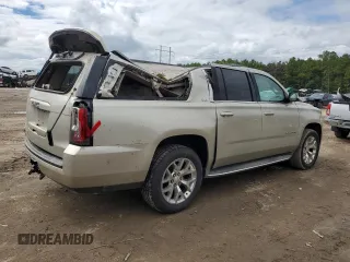 2015 GMC Yukon XL SLT with VIN 1GKS1HKC5FR168608, listed as a Copart auction lot 71564384 with 197,538 mi miles and Salvage Title. Bid and sale history available at carsss.com. Image 3.