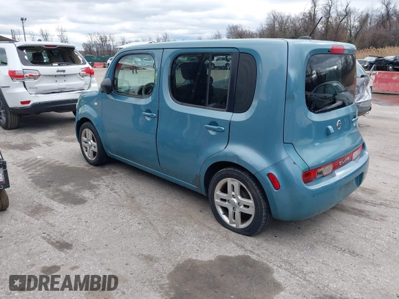 2010 Nissan Cube S z VIN JN8AZ2KRXAT170470, wystawiony jako IAAI lot #41751544 z przebiegiem 108 437 mil mil oraz . Historia ofert i sprzedaży dostępna na DreamBid. Obrazek 3.