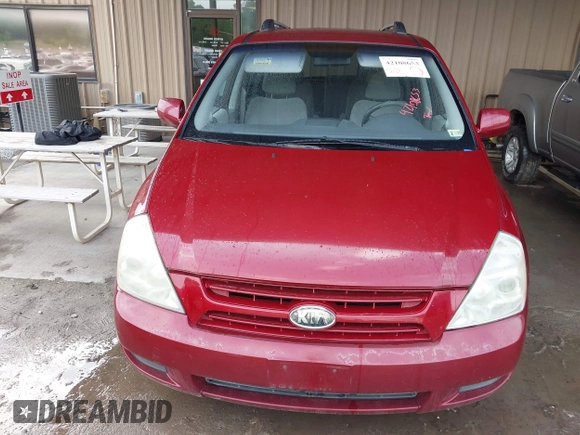 2009 Kia Sedona LX with VIN KNDMB233X96277536, listed as a IAAI auction lot 42108653 with 260,258 mi miles. Bid and sale history available at carsss.com. Image 6.