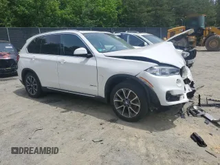 2015 BMW X5 xDrive35i z VIN 5UXKR0C53F0K61488, wystawiony jako Copart lot #57421645 z przebiegiem Nie podano mil oraz Szkoda całkowita • Salvage title. Historia ofert i sprzedaży dostępna na DreamBid. Obrazek 4.