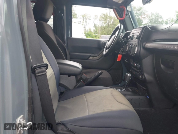 2015 Jeep Wrangler Unlimited Sport with VIN 1C4HJWDG1FL635620, listed as a IAAI auction lot 42396137 with 87,352 mi miles and . Bid and sale history available at DreamBid. Image 5.