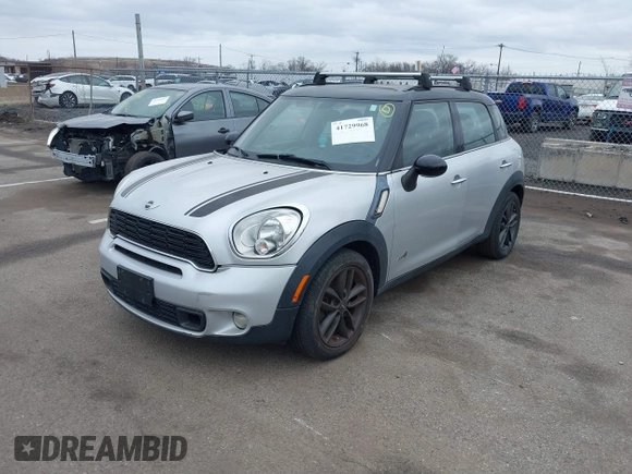 2012 MINI Countryman S with VIN WMWZC5C5XCWL55727, listed as a IAAI auction lot 41729968 with 103,935 mi miles and . Bid and sale history available at DreamBid. Image 2.