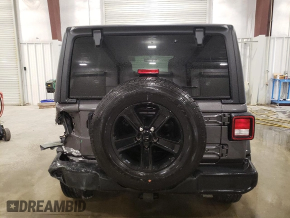 2023 Jeep Wrangler Sport Altitude with VIN 1C4HJXDG0PW679789, listed as a Copart auction lot 65991094 with 13,503 mi miles and Salvage Title. Bid and sale history available at DreamBid. Image 6.