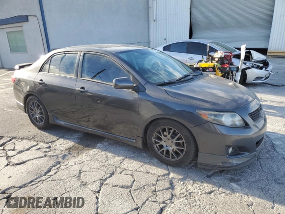 2009 Toyota Corolla XRS with VIN 1NXBE40E59Z136994, listed as a Copart auction lot 87711105 with 114,254 mi miles and Salvage Title. Bid and sale history available at carsss.com. Image 4.