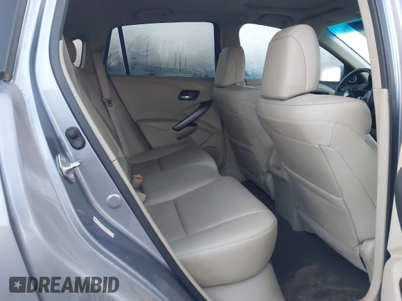 2014 Acura RDX with VIN 5J8TB3H3XEL005947, listed as a IAAI auction lot 41999309 with 133,531 mi miles and . Bid and sale history available at DreamBid. Image 8.