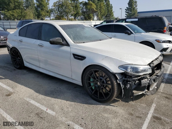 2014 BMW M5 with VIN WBSFV9C56ED097642, listed as a Copart auction lot 87054484 with 77,022 mi miles and Salvage Title. Bid and sale history available at carsss.com. Image 4.