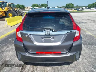 2015 Honda Fit EX-L z VIN 3HGGK5H89FM730013, wystawiony jako IAAI lot #42673309 z przebiegiem 142 660 mil mil oraz . Historia ofert i sprzedaży dostępna na DreamBid. Obrazek 16.