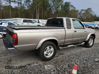 2000 Nissan Frontier XE z VIN 1N6ED26T5YC413840, wystawiony jako Copart lot #81996434 z przebiegiem 189 884 mil mil oraz Szkoda całkowita • Salvage title. Historia ofert i sprzedaży dostępna na DreamBid. Obrazek 3.