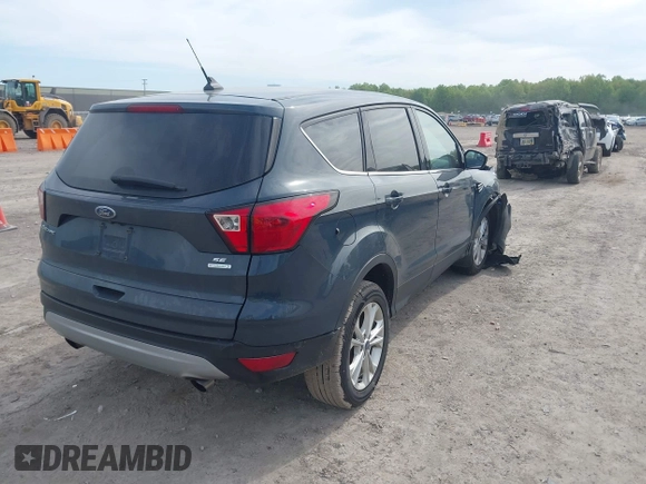 2019 Ford Escape SE z VIN 1FMCU0GD2KUB98923, wystawiony jako IAAI lot #42245972 z przebiegiem 91 193 mil mil oraz . Historia ofert i sprzedaży dostępna na DreamBid. Obrazek 4.