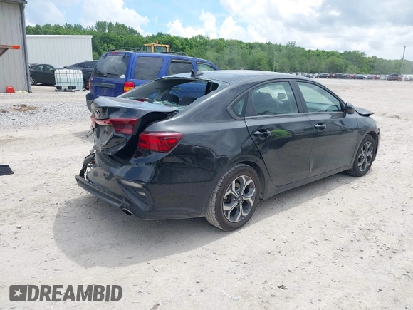 2021 Kia Forte LXS with VIN 3KPF24ADXME297496, listed as a IAAI auction lot 42274152 with 80,345 mi miles and . Bid and sale history available at DreamBid. Image 4.