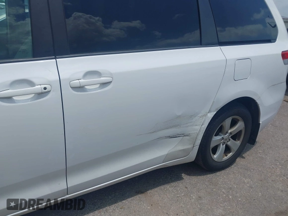2014 Toyota Sienna LE AAS with VIN 5TDKK3DC0ES525654, listed as a IAAI auction lot 42153582 with 71,258 mi miles and . Bid and sale history available at carsss.com. Image 6.