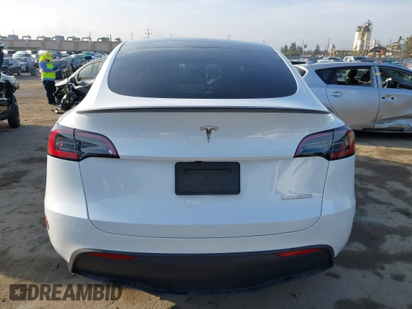 2023 Tesla Model Y Performance with VIN 7SAYGDEF0PF839468, listed as a IAAI auction lot 41609263 with 25,434 mi miles and . Bid and sale history available at DreamBid. Image 17.