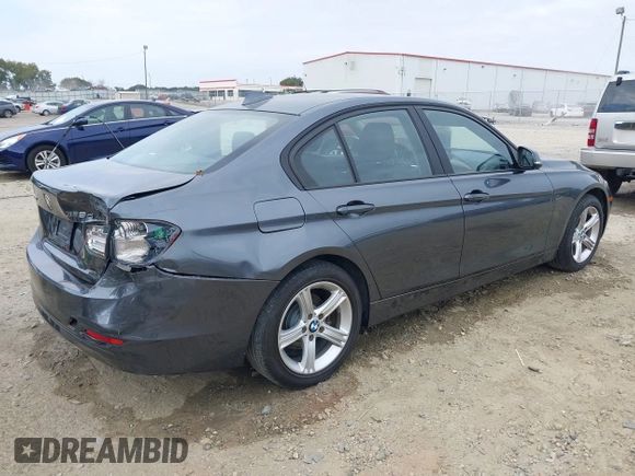 2014 BMW 3 Series 328d xDrive with VIN WBA3D5C59EKX96701, listed as a IAAI auction lot 40716972 with 163,775 mi miles. Bid and sale history available at carsss.com. Image 4.