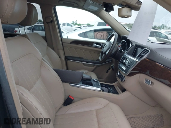 2014 Mercedes-Benz GL 450 with VIN 4JGDF7CE0EA372225, listed as a IAAI auction lot 42141012 with 158,045 mi miles and . Bid and sale history available at DreamBid. Image 5.