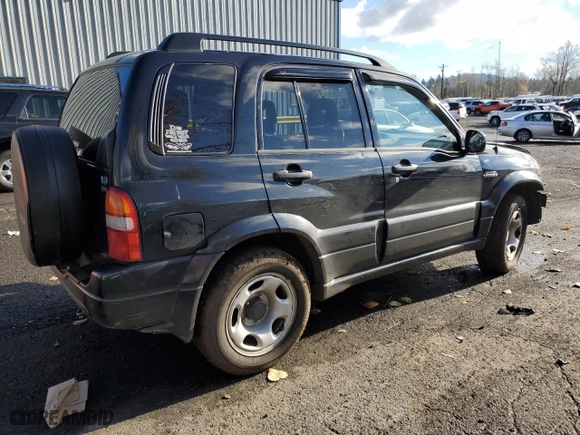 2002 Suzuki Grand Vitara JLX with VIN JS3TD62V324154082, listed as a Copart auction lot 84174574 with 236,372 mi miles and Salvage Title. Bid and sale history available at carsss.com. Image 3.