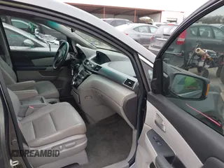2012 Honda Odyssey Touring with VIN 5FNRL5H96CB138548, listed as a IAAI auction lot 41471856 with 186,284 mi miles and . Bid and sale history available at DreamBid. Image 5.