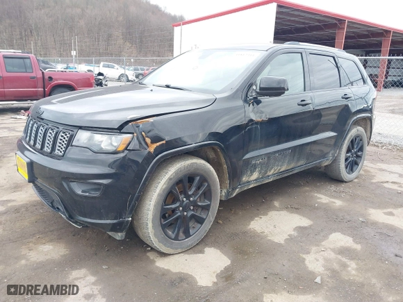 2018 Jeep Grand Cherokee Laredo E with VIN 1C4RJFAG3JC324434, listed as a IAAI auction lot 41812311 with 140,820 mi miles. Bid and sale history available at carsss.com. Image 17.