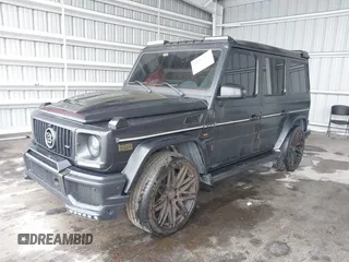 2014 Mercedes-Benz G-Class G 63 AMG with VIN WDCYC7DF7EX221914, listed as a IAAI auction lot 40192383 with 59,131 mi miles. Bid and sale history available at carsss.com. Image 2.