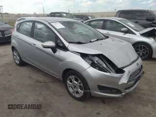 2016 Ford Fiesta SE with VIN 3FADP4EJ0GM198338, listed as a IAAI auction lot 28660870 with 68,135 mi miles. Bid and sale history available at carsss.com. Image 1.