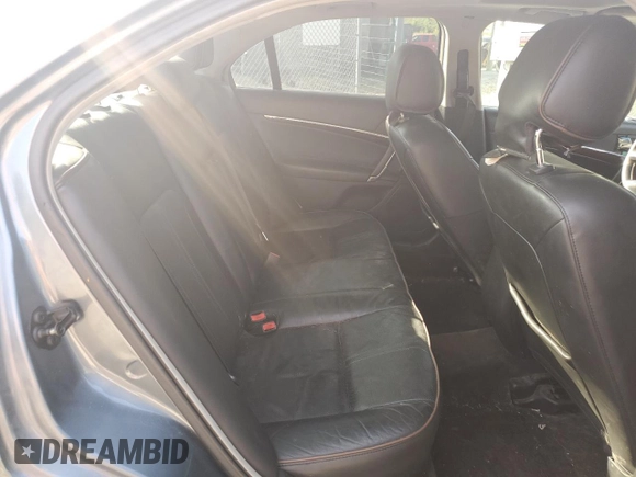 2012 Lincoln MKZ z VIN 3LNHL2GCXCR827302, wystawiony jako Copart lot #70519604 z przebiegiem 150 416 mil mil oraz Szkoda całkowita • Salvage title. Historia ofert i sprzedaży dostępna na DreamBid. Obrazek 10.