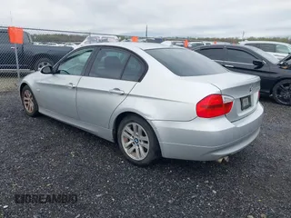 2007 BMW 3 Series 328i with VIN WBAVA33557PG53078, listed as a IAAI auction lot 41936187 with 186,492 mi miles. Bid and sale history available at carsss.com. Image 3.