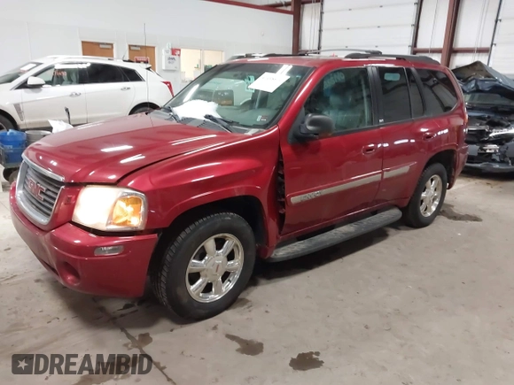 2003 GMC Envoy SLT with VIN 1GKDT13SX32134944, listed as a IAAI auction lot 41498519 with 149,640 mi miles. Bid and sale history available at carsss.com. Image 2.