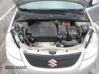 2013 Suzuki SX4 LE with VIN JS2YC5A36D6100791, listed as a IAAI auction lot 41909191 with 180,597 mi miles and . Bid and sale history available at DreamBid. Image 10.