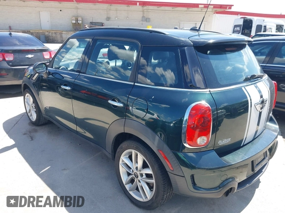 2011 MINI Countryman S with VIN WMWZC5C53BWM10484, listed as a IAAI auction lot 42250690 with 113,534 mi miles and . Bid and sale history available at DreamBid. Image 3.