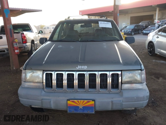 1998 Jeep Grand Cherokee Laredo with VIN 1J4GZ58S9WC136684, listed as a IAAI auction lot 41444103 with 1 mi miles. Bid and sale history available at carsss.com. Image 11.