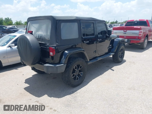 2015 Jeep Wrangler Unlimited Sahara with VIN 1C4HJWEG6FL572674, listed as a IAAI auction lot 42736266 with 97,024 mi miles and . Bid and sale history available at DreamBid. Image 4.