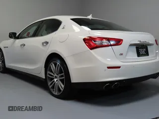 2014 Maserati Ghibli S Q4 z VIN ZAM57RTA7E1094580, wystawiony jako Copart lot #58866195 z przebiegiem 79 463 mil mil oraz Szkody całkowita. Historia ofert i sprzedaży dostępna na DreamBid. Obrazek 4.