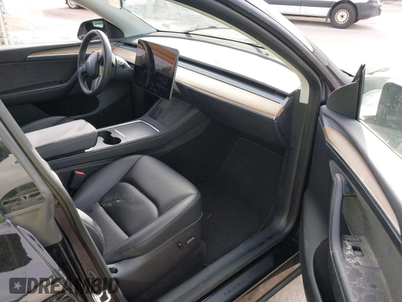 2023 Tesla Model Y Long Range with VIN 7SAYGDEE2PA044328, listed as a IAAI auction lot 42427625 with 41,324 mi miles and . Bid and sale history available at DreamBid. Image 5.