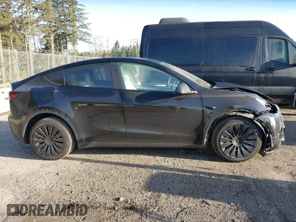 2023 Tesla Model Y Long Range z VIN 7SAYGDEE9PF637042, wystawiony jako IAAI lot #41969086 z przebiegiem 25 524 mil mil oraz . Historia ofert i sprzedaży dostępna na DreamBid. Obrazek 13.