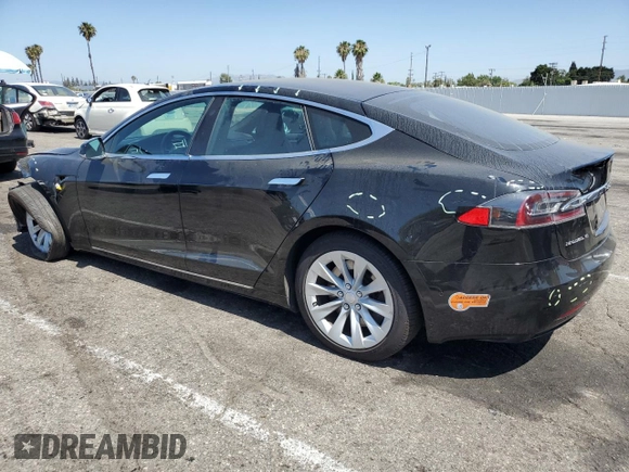 2018 Tesla Model S 75D с VIN 5YJSA1E24JF248762, выставлен на аукционе Copart как лот 61501075 с пробегом 63 802 миль миль и Списание • Salvage title. История ставок и продаж доступна на DreamBid. Изображение 2.