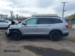 2021 Honda Pilot Special Edition with VIN 5FNYF6H20MB061334, listed as a IAAI auction lot 42123022 with 92,183 mi miles and . Bid and sale history available at DreamBid. Image 15.