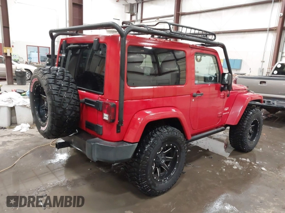 2011 Jeep Wrangler Sahara with VIN 1J4AA5D10BL593534, listed as a IAAI auction lot 41551416 with 101,716 mi miles and . Bid and sale history available at DreamBid. Image 4.