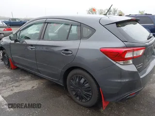 2019 Subaru Impreza with VIN 4S3GTAA69K1711062, listed as a IAAI auction lot 42187136 with 91,423 mi miles and . Bid and sale history available at DreamBid. Image 3.