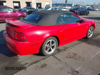 2000 Ford Mustang with VIN 1FAFP4444YF198834, listed as a IAAI auction lot 40780129 with 189,915 mi miles. Bid and sale history available at carsss.com. Image 4.