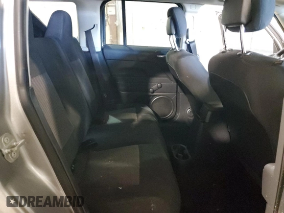 2016 Jeep Patriot Sport SE z VIN 1C4NJPBA8GD679214, wystawiony jako Copart lot #88990335 z przebiegiem 131 640 mil mil oraz Szkoda całkowita • Salvage title. Historia ofert i sprzedaży dostępna na DreamBid. Obrazek 11.