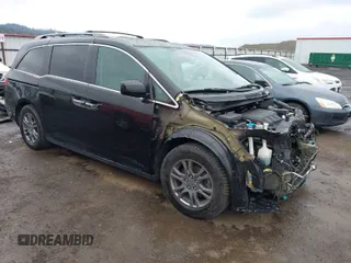2013 Honda Odyssey EX-L with VIN 5FNRL5H69DB067983, listed as a IAAI auction lot 41879405 with 70,925 mi miles and . Bid and sale history available at carsss.com. Image 1.