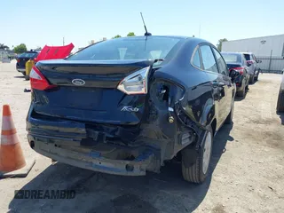 2015 Ford Fiesta S with VIN 3FADP4AJ1FM189751, listed as a IAAI auction lot 42374537 with 105,726 mi miles and . Bid and sale history available at DreamBid. Image 4.