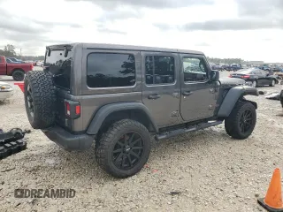 2018 Jeep Wrangler Unlimited Rubicon with VIN 1C4HJXFN9JW249214, listed as a Copart auction lot 42692175 with 161,157 mi miles and Salvage title. Bid and sale history available at DreamBid. Image 3.