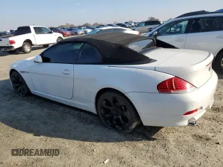 2005 BMW 6 Series 645Ci with VIN WBAEK73445B327467, listed as a Copart auction lot 82339674 with 135,052 mi miles and Salvage Title. Bid and sale history available at carsss.com. Image 2.