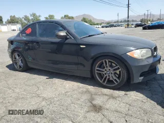 2011 BMW 1 Series 135i with VIN WBAUC9C59BVM10528, listed as a Copart auction lot 61499025 with 160,557 mi miles and Salvage title. Bid and sale history available at DreamBid. Image 4.