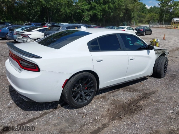 2016 Dodge Charger Road/Track with VIN 2C3CDXCT9GH210865, listed as a IAAI auction lot 39971429 with 157,784 mi miles. Bid and sale history available at carsss.com. Image 4.