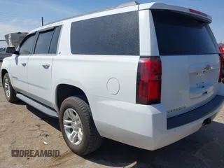2018 Chevrolet Suburban LT with VIN 1GNSKHKC5JR104240, listed as a IAAI auction lot 41892859 with Not Provided miles and . Bid and sale history available at DreamBid. Image 3.