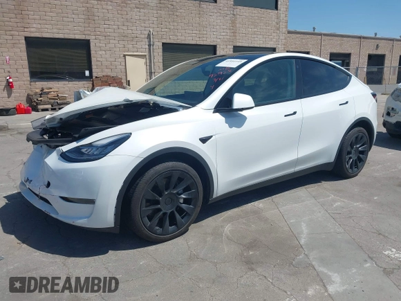 2023 Tesla Model Y Long Range with VIN 7SAYGDEE8PF612438, listed as a IAAI auction lot 41991145 with 29,775 mi miles and . Bid and sale history available at carsss.com. Image 2.
