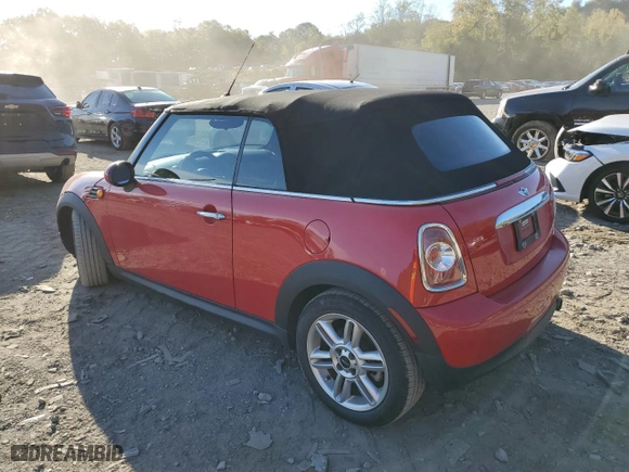 2014 MINI Cooper Convertible with VIN WMWZN3C5XET861142, listed as a Copart auction lot 75665764 with 71,208 mi miles and Salvage Title. Bid and sale history available at carsss.com. Image 2.