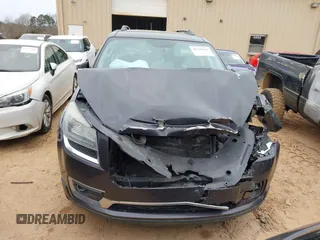 2014 GMC Acadia SLT with VIN 1GKKRRKD8EJ328145, listed as a IAAI auction lot 41376965 with 128,711 mi miles. Bid and sale history available at carsss.com. Image 12.